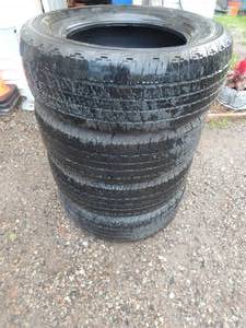 lot 78 image: Set of 4 Goodyear Wrangler 26565R18 Truck Tires