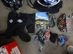 lot 99 image: Harley rain boot covers skullcaps and more.