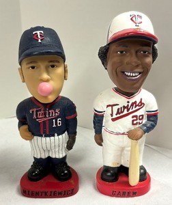 lot 112 image: Minnesota Twins Baseball Bobble Head Figurines including a Minnesota Twins Rod Carew Bobblehead