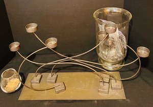 lot 173 image: Home Decor Including Candle Holder, Hurricane Glass with Rocks and Small Glass Vase