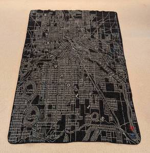 lot 13 image: Dark Grey Fairbault Wool Minneapolis Map Throw Blanket