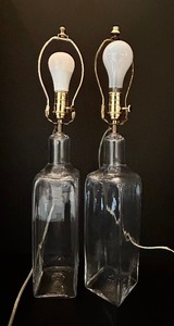lot 76 image: Pair of Glass Bottle Lamps