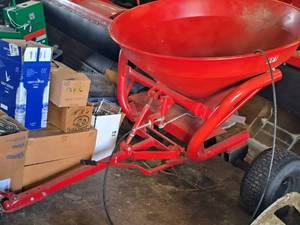 lot 18 image: Tow-Behind Two Wheel Spreader 55