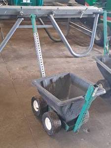 lot 25 image: 4-wheel Pull-BehindPush Spreader