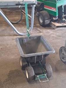 lot 26 image: 4-wheel Pull-BehindPush Spreader