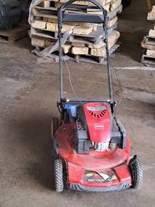 lot 32 image: Toro Gas Push Lawn Mower 20333