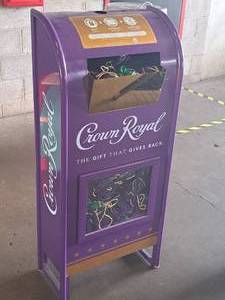 lot 62 image: Crown Royal logo Metal Donation Box