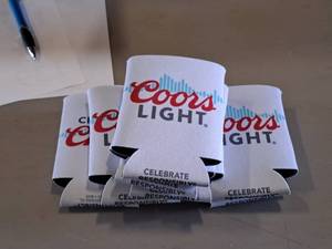lot 142 image: Lot of (7) Coors Light logo Can Coolers