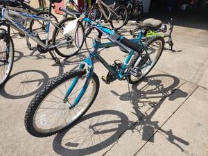 lot 414 image: Huffy Wolverine 24 Mens 15-speed Trail Bicycle 18 Light Blue Frame