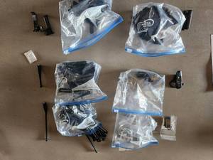 lot 182 image: Lot of  Motorola Digital Mobile Radio Accessories - Antennas, Ear Pieces