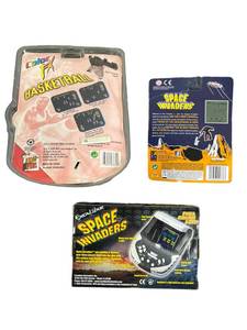 lot 29 image: Vintage (New Old Stock) Handheld Electronic Games - 1999 Color FX Basketball2011 Space InvadersExcalibur Space Invaders