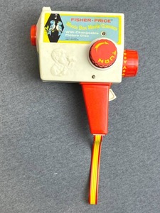lot 33 image: Toy Lot - 2008 Pokemon Zanzoon Trainer (Works)NECA A Christmas Story Watch2002 Strawberry Shortcake WatchHallmark Text BandsVintage Fisher Price Music Box Movie Camera in Working Condition