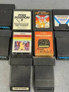 lot 51 image: Vintage Atari 2600 Video Game Lot including Yars Revenge, Gangster Alley, Riddle of the Sphinx, Pole Position 2, and More