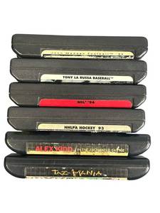 lot 53 image: SEGA Genesis Video Game Lot including Alex Kidd, Taz-Mania, and More