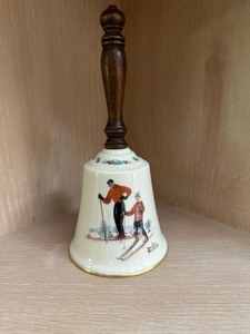 lot 68 image: Vintage Norman Rockwell Ski Skills 1981 Bell by Gorham Fine China