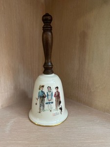 lot 61 image: Vintage Norman Rockwell Young Mans Fancy 1982 Bell by Gorham Fine China