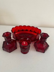 lot 84 image: Ruby Red Fostoria Oval Dish and Candle Holders