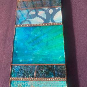 lot 64 image: Tile Art Totems PATTY CARMODY SMITH