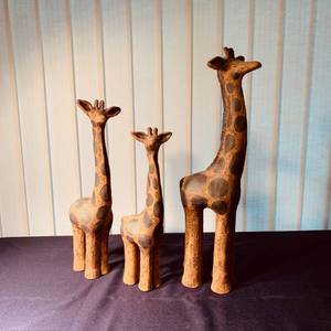 lot 65 image: Solid Clay Giraffe Family of 3