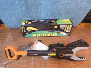 lot 84 image: Weed Eater and Jaw Saw