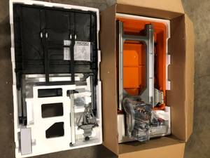 lot 16 image: RIDGID 12 Amp 8 in. Blade Corded Wet Tile Saw with Extended Rip Customer Returns See Pictures