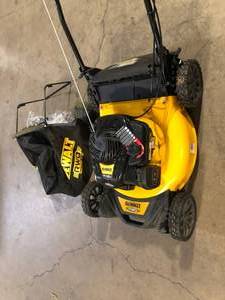 lot 19 image: DEWALT 21 in. 150cc Briggs and Stratton 625ex Engine Rear Wheel Drive 2-in-1 Gas Self Propelled Walk Behind Lawn Mower Used  Customer Returns See Pictures