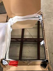 lot 28 image: Home Decorators Collection Ryan 24 in. W x 33 in. H Rectangular Stainless Steel Framed Wall Bathroom Vanity Mirror in Matte Black  Customer Returns See Pictures