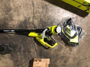 lot 40 image: RYOBI ONE 18V 13 in. Cordless Battery String TrimmerEdger (Tool Only) Customer Returns See Pictures