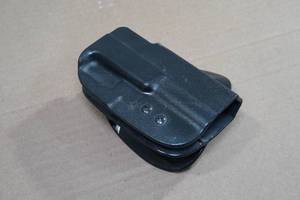 lot 92 image: Uncle Mikes Paddle Gun Holster