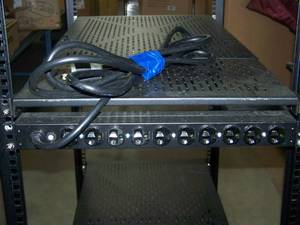 lot 72 image: Large, Server Rack with Power Strip and Enclosed Shelf