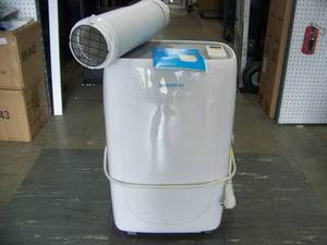 lot 75 image: Emerson, Quiet Kool, Portable Air Conditioner (AC)