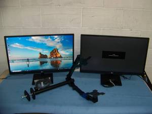 lot 80 image: (2) 27 LG Computer  PC Monitors on Stands with Dual Monitor Desk Mount