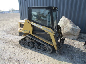 lot 1 image: ASV RC-30 Skidsteer with (2) Dirt Buckets, Pallet Forks, Grapple Bucket & Tiller