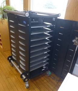 lot 106 image: Technology cabinet designed to store and charge 20 laptops