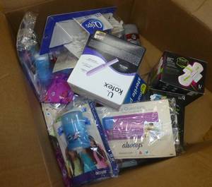 lot 125 image: Large group of health items, sample deodorant, period supplies, bandages,