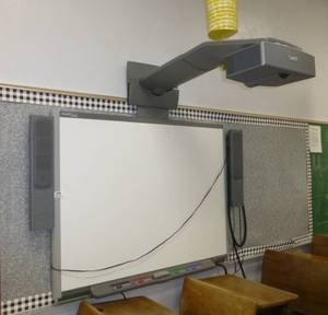 lot 204 image: SmartBoard mounted on wall with projector and speakers
