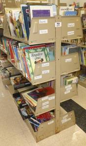lot 209 image: Shelving unit and books - Biography, Presidents, Folklore, Novels, Series, Dogs, Cats, Horses