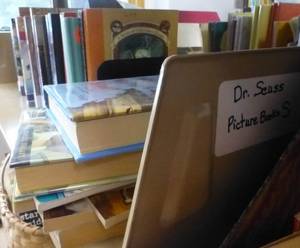 lot 214 image: Shelving unit and books - Pop-ups, Dr Seuss, Picture Books, Novel