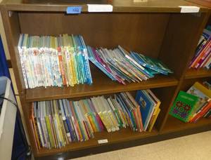 lot 222 image: Bookshelf and books - Dr Seuss, Fairy Tales, classics