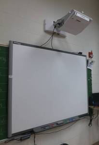 lot 604 image: SmartBoard mounted on wall with Hitachi projector