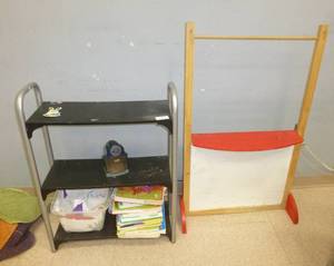 lot 611 image: shelf and contents and whiteboard