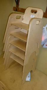 lot 815 image: FIVE stackable wood chairs