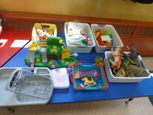 lot 826 image: table full of toys - table not included