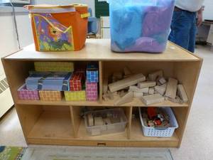 lot 908 image: Double sided Wood Storage cabinet, with contents 48x28x29