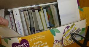 lot G22 image: Totes of books, binders, games, hats