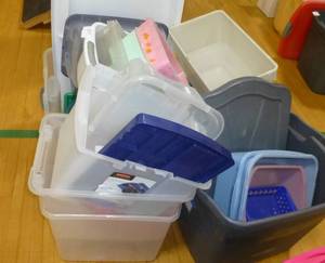 lot G27 image: Large group of totes of various size