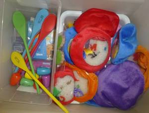 lot G33 image: Two totes of misc toys, rug