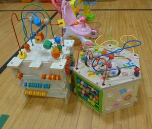 lot G56 image: Two like new EverEarth activity cubes with lots going on