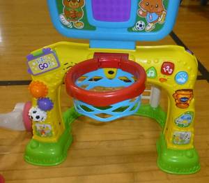 lot G57 image: Doll stroller and Smart shot play center