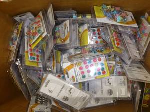 lot G58 image: Box full of all New packs of Smiley Face tacks, small binders, probably 150